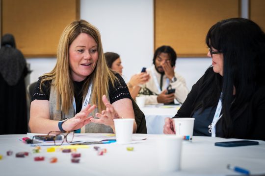 Careers staff sat in discussion as part of a regional meeting