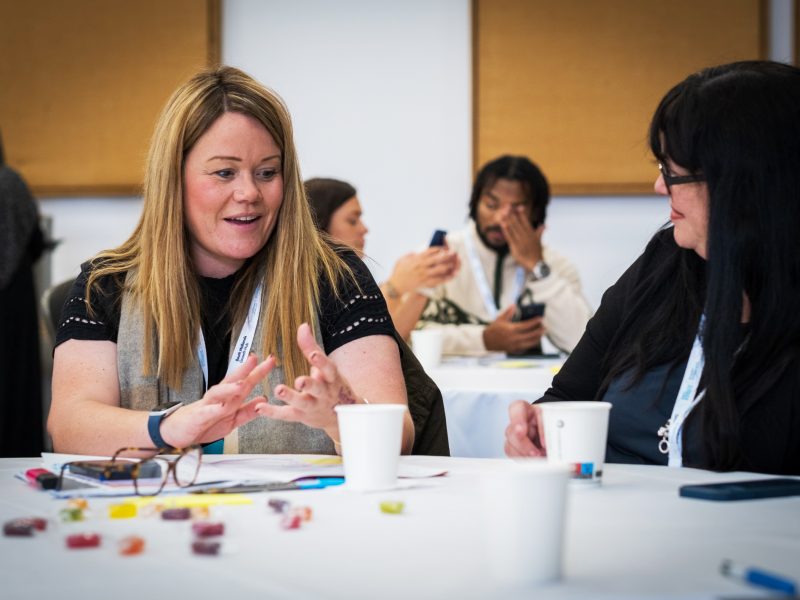 Careers staff in discussion as part of a regional meeting
