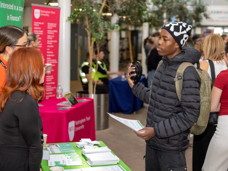 A student meeting an employer at a Meadowhead School careers event