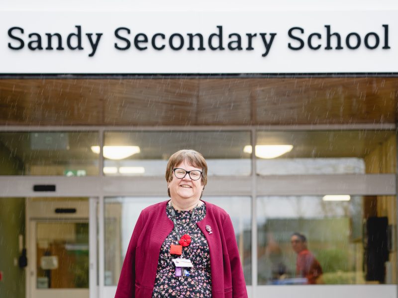 Karen Hayward stood at the entrance of Sandy Secondary School